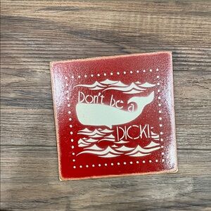 3/15$ - Red and Cream Decorative Tile